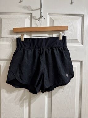 Asics Black Women's Running Shorts with Subtle Grid Pattern